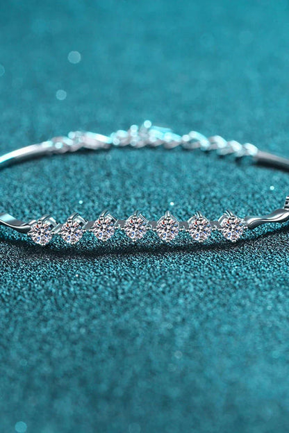 Elegant moissanite and sterling silver bracelet with a rhodium plated finish, designed for sophisticated style.