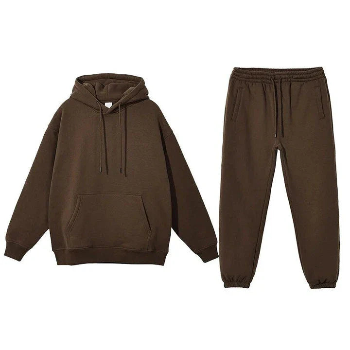 Cosy fleece hoodie and jogger set in light pink, grey, and navy blue colours for ultimate comfort and style