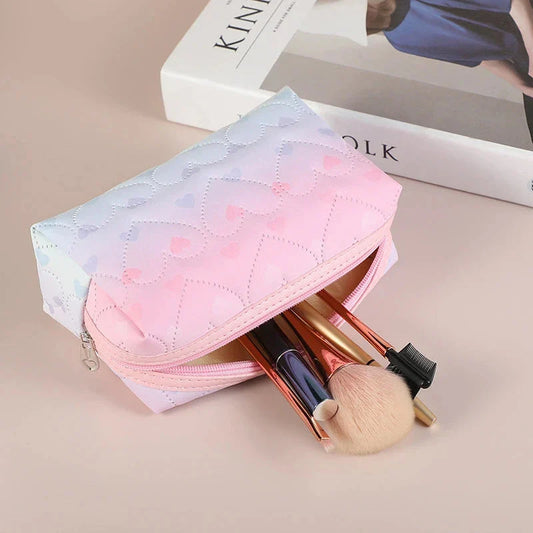 Stylish large-capacity waterproof cosmetic bag with heart pattern design, perfect for organising makeup, skincare, and travel essentials