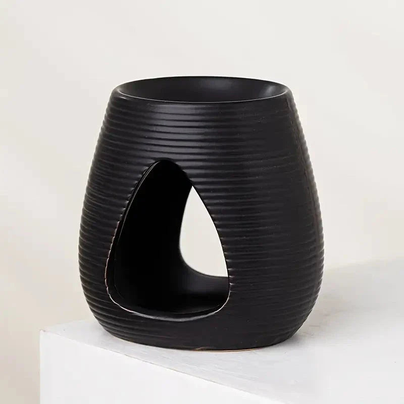Trendha Porcelain Aroma Diffuser and Candle Holder in white and black finishes, featuring a minimalist design for stylish home decor and relaxing aromatherapy
