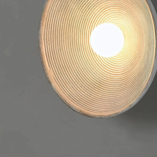 Elegant round wall light fixture with minimalist Wabi Sabi design, providing warm LED illumination for bedrooms and corridors