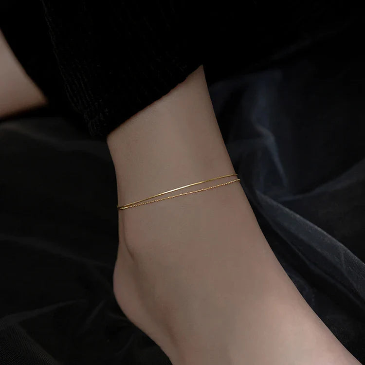 Elegant 14K gold-plated sterling silver anklet with intricate floral pattern and adjustable length