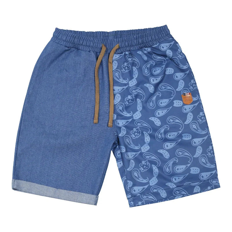 Relaxed-fit sports shorts in light blue and denim blue mosaic patterns, designed for casual everyday wear