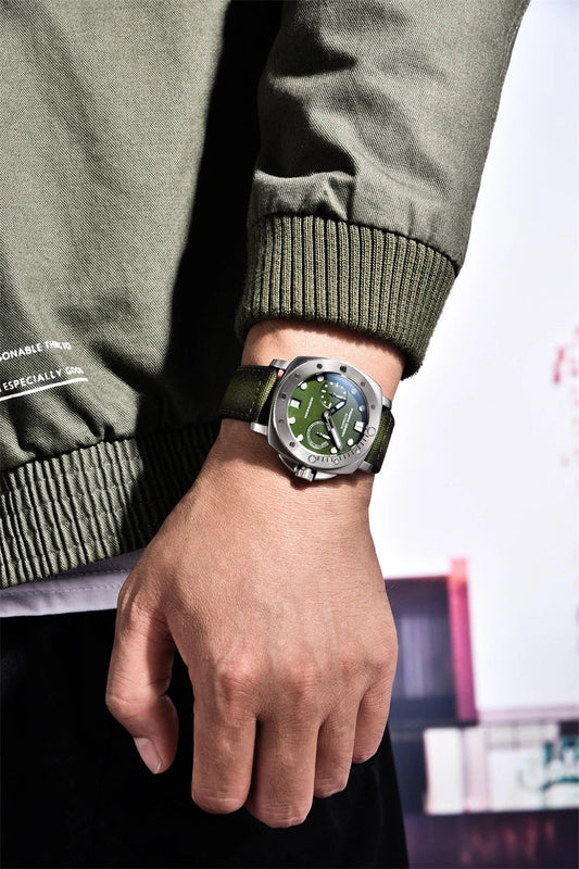 Sophisticated waterproof automatic mechanical watch with stainless steel case and textile strap, available in black, grey, green, and blue colour options