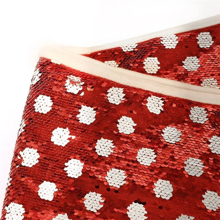 Elegant Christmas tree skirt with red and white polka dot sequin pattern, designed to fit most standard-sized trees and elevate holiday decor.