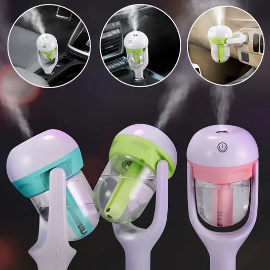 Compact mini car steam humidifier and aroma diffuser with pink colour, designed to improve air quality and promote relaxation in your vehicle