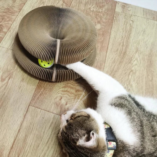 Premium Cat Scratch Board Toy made from durable corrugated cardboard with an interactive bell toy to engage and entertain your cat
