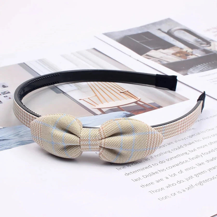 Charming bow headband for girls, a stylish hair accessory made from high-quality canvas and rubber for a comfortable, secure fit