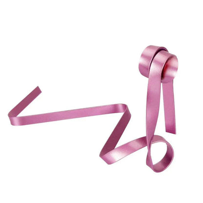 Floating wine bottle holder with sophisticated ribbon-like design, creating a mesmerising illusion of weightlessness