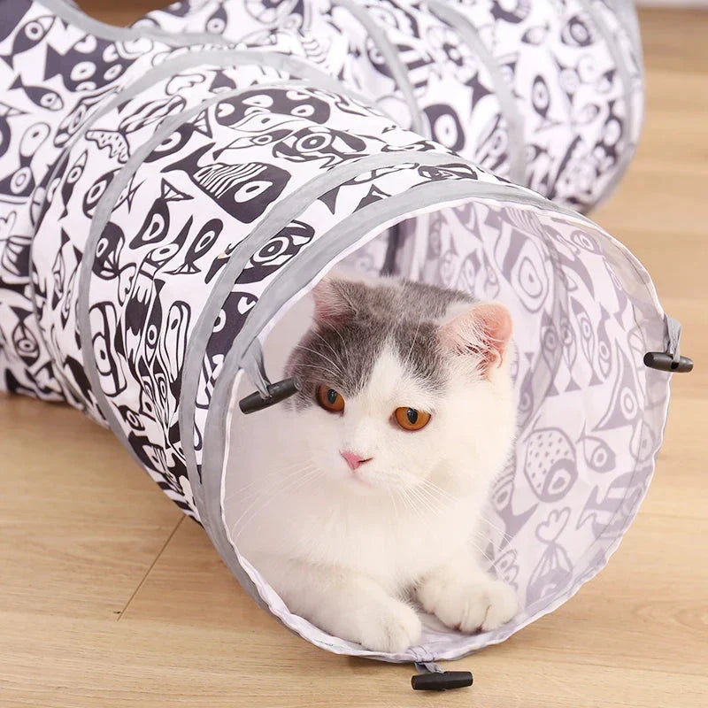 Foldable interactive pet tunnel made of durable polyester in black and white, designed for cats, rabbits, and other small animals to explore and play