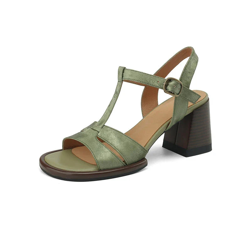 Genuine leather gladiator sandals with chunky heel, open-toe design, and secure buckle closure for summer style and comfort.