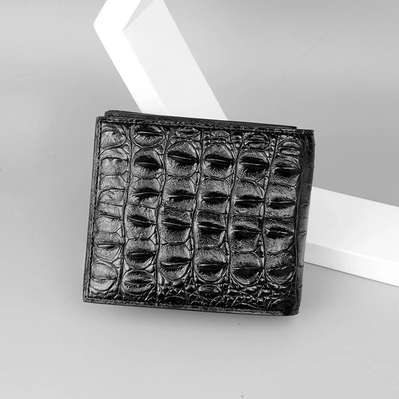 Sophisticated men's leather wallet in black, made from premium crocodile skin for a refined and durable everyday accessory