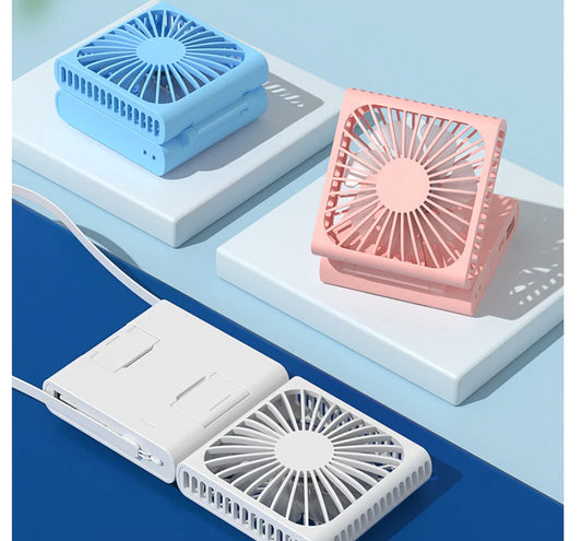 Compact portable USB power bank with built-in cooling fan, perfect for on-the-go use by British consumers
