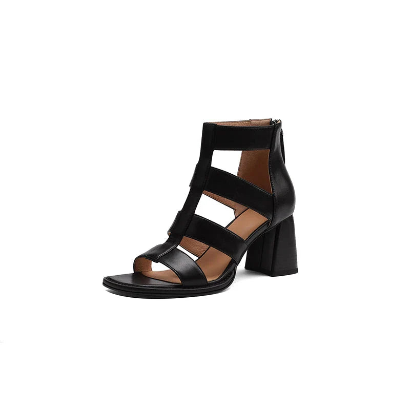 Luxurious leather gladiator sandals with square heel and buckle strap, providing style and comfort for any occasion.