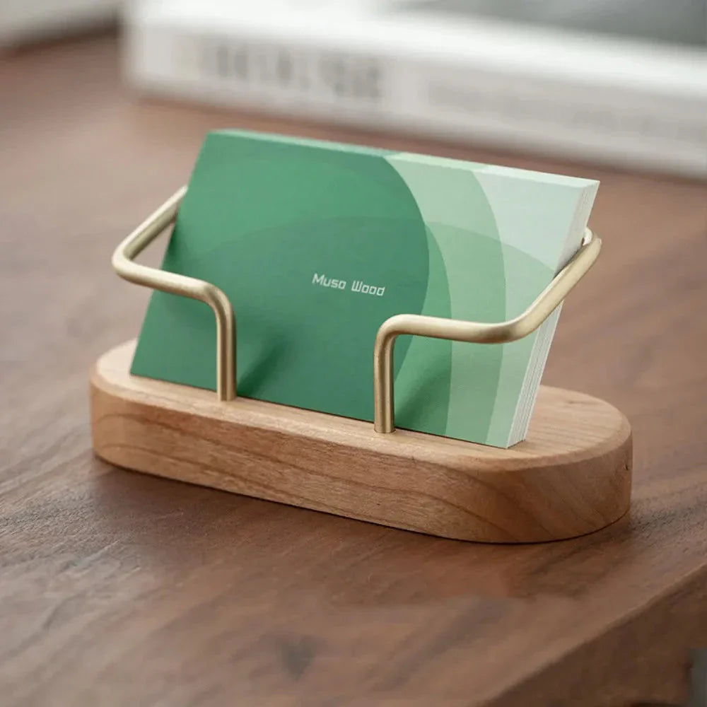 Elegant wooden business card holder made of premium black walnut or beech wood, designed for use on office desks and in home workspaces.