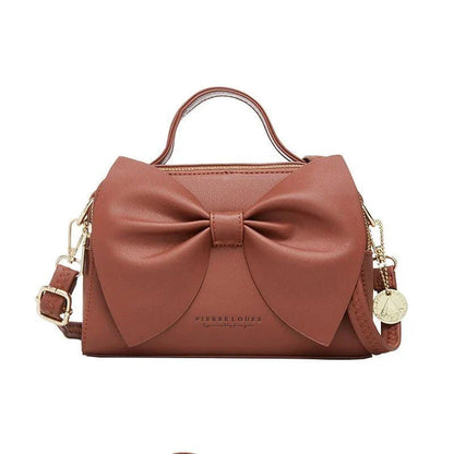 Elegant brown Korean-inspired bow shoulder bag with adjustable strap and roomy interior