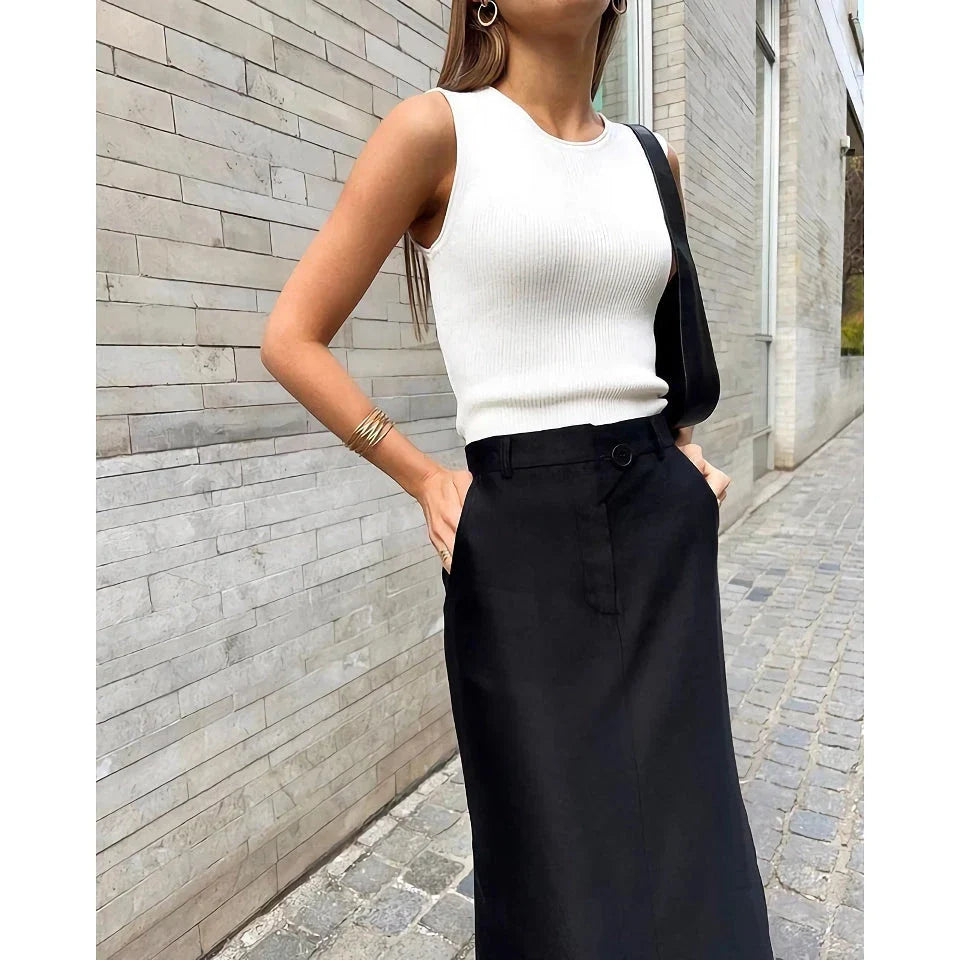 Elegant black ankle-length A-line skirt with pockets, made of high-quality polyester, spandex, and viscose blend fabric