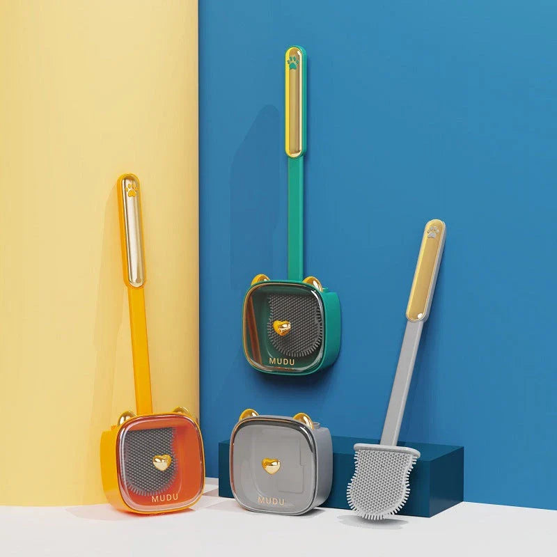 Stylish cat-themed wall-mounted toilet brush set in various colours, including green, orange, white, and grey