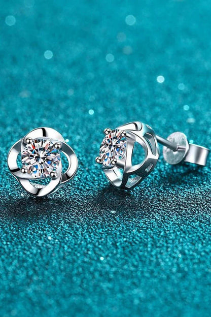 Pair of rhodium-plated moissanite stud earrings with a sleek, minimalist design