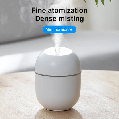 Compact ultrasonic humidifier and aroma diffuser with LED night lamp, available in white colour