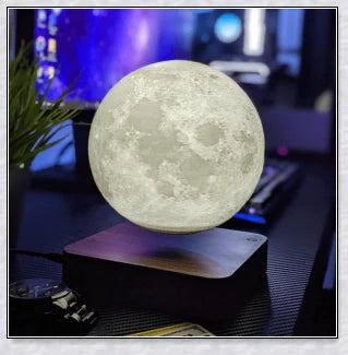 Lunamen Magnetic Levitating Moon Lamp with detailed lunar surface and floating above magnetic base