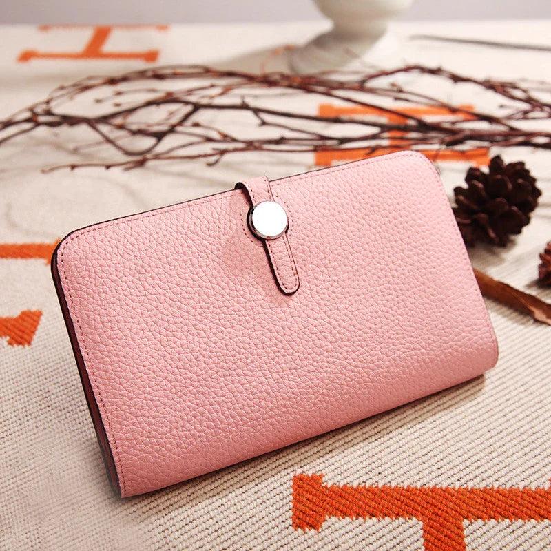 Premium cowhide leather wallet with luxurious lychee pattern design, featuring multiple compartments for secure storage and organisation.