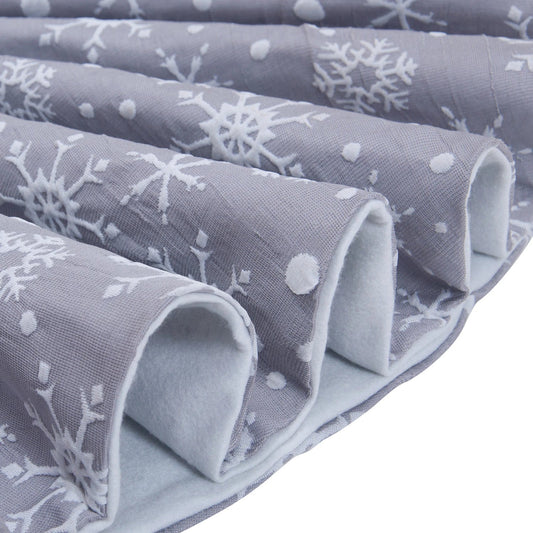 Premium grey background tree skirt with delicate white snowflake patterns, perfect for traditional British Christmas decor