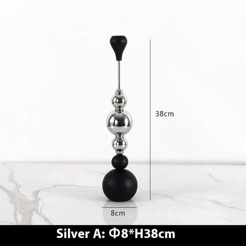 Elegant stainless steel and wooden candlestick set with a captivating design that creates a soothing ambience in any living space