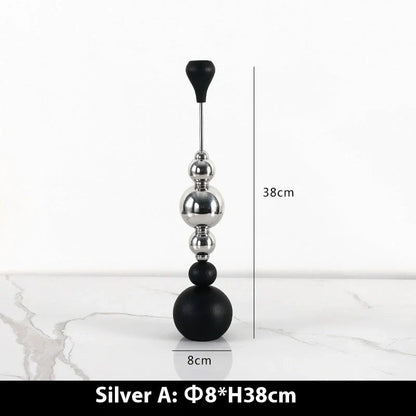 Elegant stainless steel and wooden candlestick set with a captivating design that creates a soothing ambience in any living space