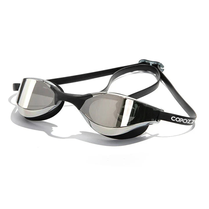 Premium British-made swimming goggles with anti-fog and UV protection technology, designed for clear visibility and comfort in pools, beaches, and water parks.