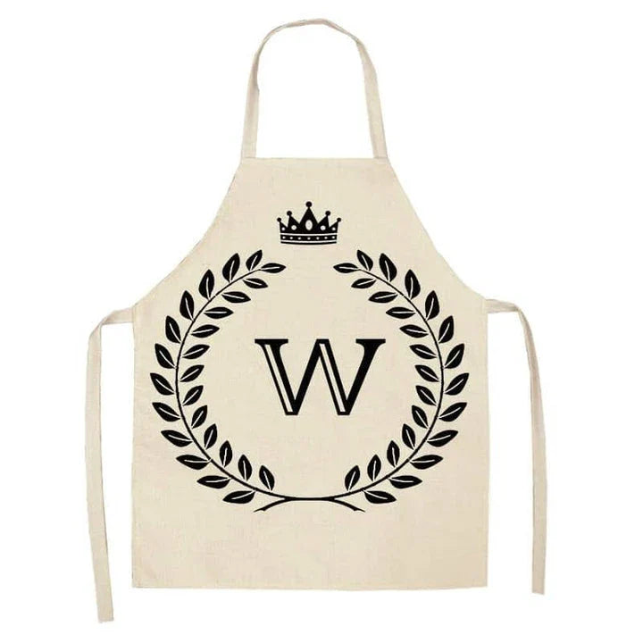 A high-quality kitchen apron featuring a charming crown and letter print design in a premium cotton and linen blend fabric.
