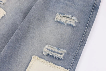 Premium heavy-duty straight-fit British denim jeans with distressed detailing and a versatile silhouette