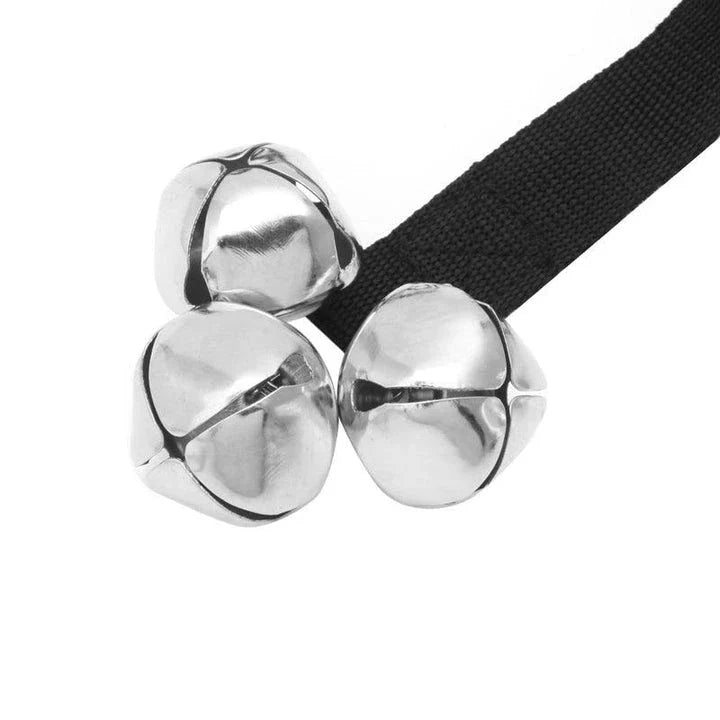 A durable dog training doorbell made of nylon and metal bells, designed to help teach your pet new skills and improve communication.
