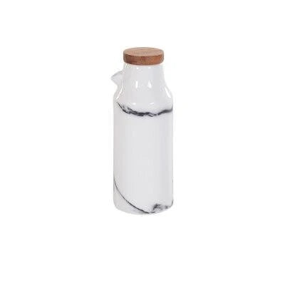 Ceramic salt and pepper shaker set with oil bottle in light grey porcelain finish, featuring minimalist design and easy-grip handles