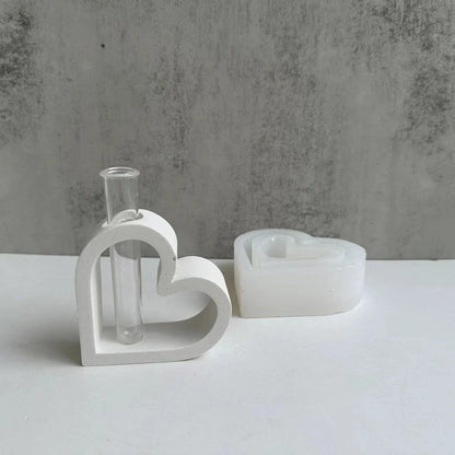 Premium silicone mould in a heart-shaped design for creating unique hydroponic vases, candles, and cement planters