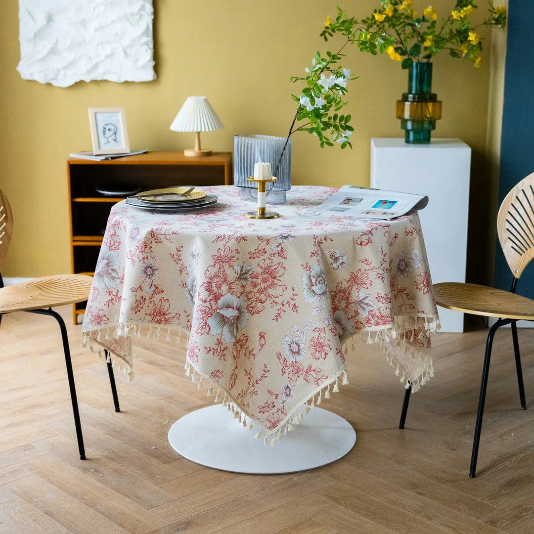 Elegant peony print cotton linen tablecloth with tassels, perfect for sophisticated home decor and dining experiences