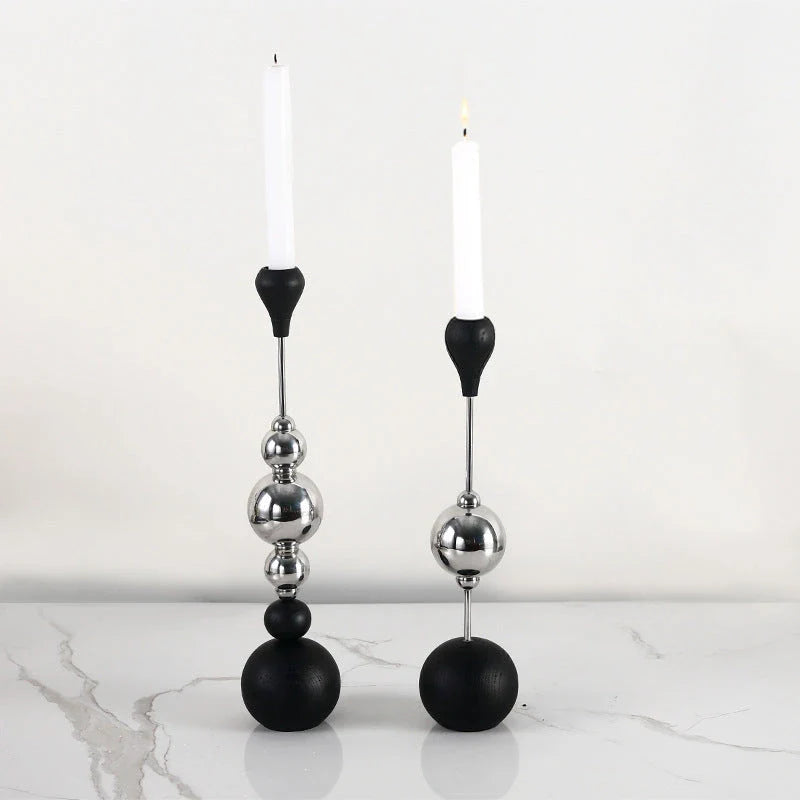 Elegant stainless steel and wooden candlestick set with a captivating design that creates a soothing ambience in any living space