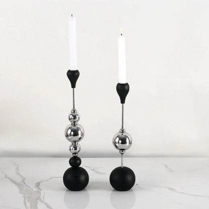 Elegant stainless steel and wooden candlestick set with a captivating design that creates a soothing ambience in any living space