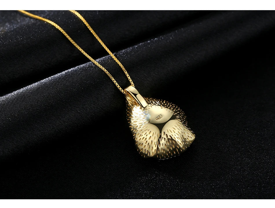 Elegant pearl pendant necklace with sterling silver setting, featuring a modern geometric design