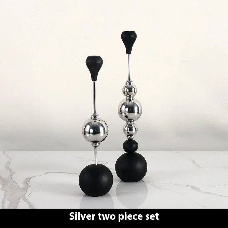 Elegant stainless steel and wooden candlestick set with a captivating design that creates a soothing ambience in any living space