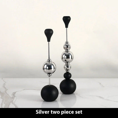 Elegant stainless steel and wooden candlestick set with a captivating design that creates a soothing ambience in any living space