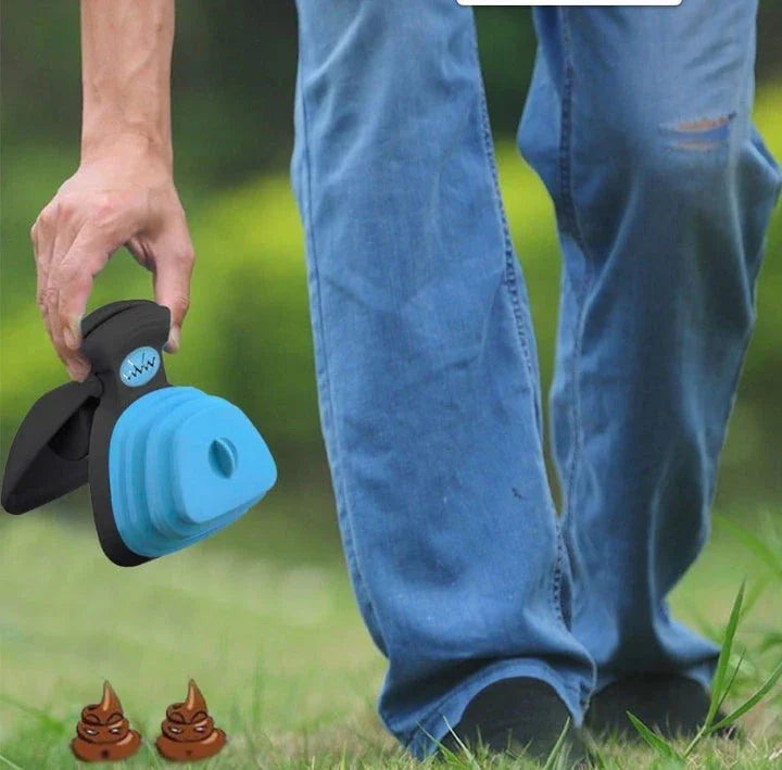 Foldable dog waste scoop with wide, comfortable grip for easy one-handed cleanup on any surface