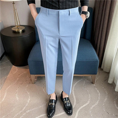 Premium men's suit trousers in a variety of colours, featuring a subtle textured drape and exceptional stretch for all-day comfort and style.