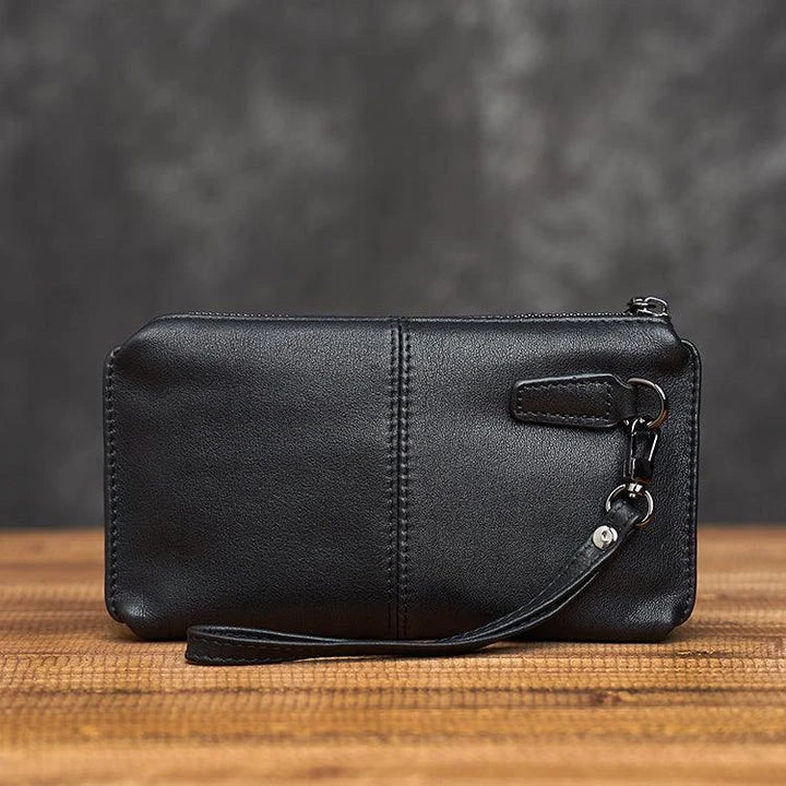 Premium genuine leather handbag in a sleek, contemporary design with secure zipper closure and internal organisation pockets