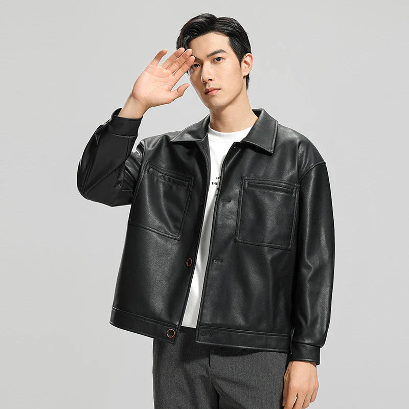 Handsome men's leather motorcycle jacket with lapel collar, dimensional pockets, and durable PU leather construction
