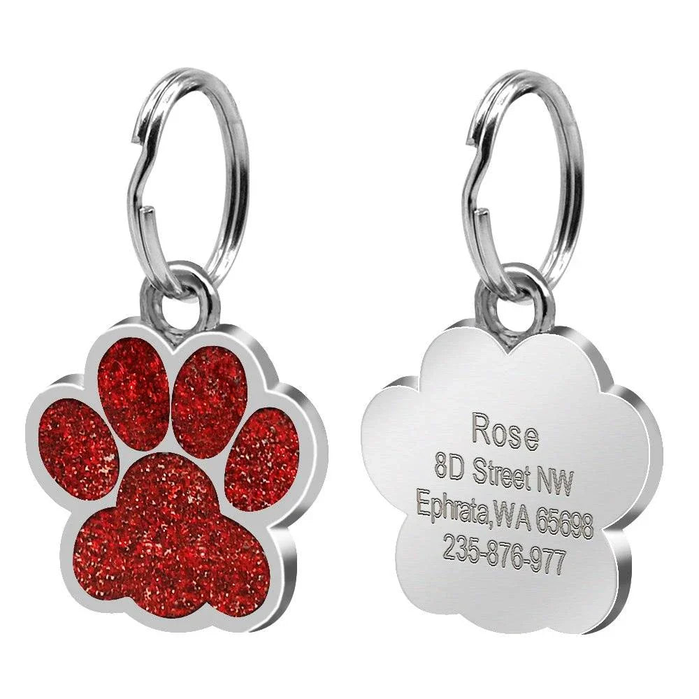 Paw-shaped pet ID tag with rhinestone embellishments, designed for safety and style