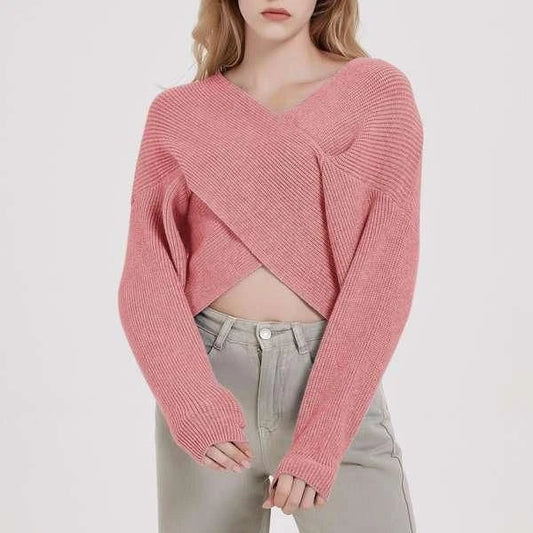 A cosy, brown V-neck knitted jumper with a relaxed, comfortable fit and a touch of vintage-inspired style.