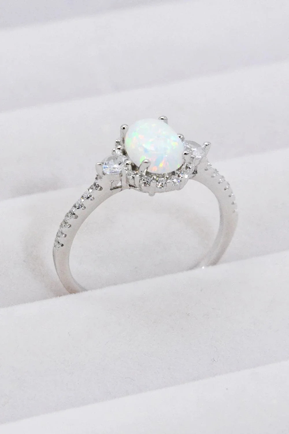 A stunning platinum-plated opal ring made from 925 sterling silver, featuring a modern and minimalist design