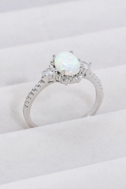 A stunning platinum-plated opal ring made from 925 sterling silver, featuring a modern and minimalist design