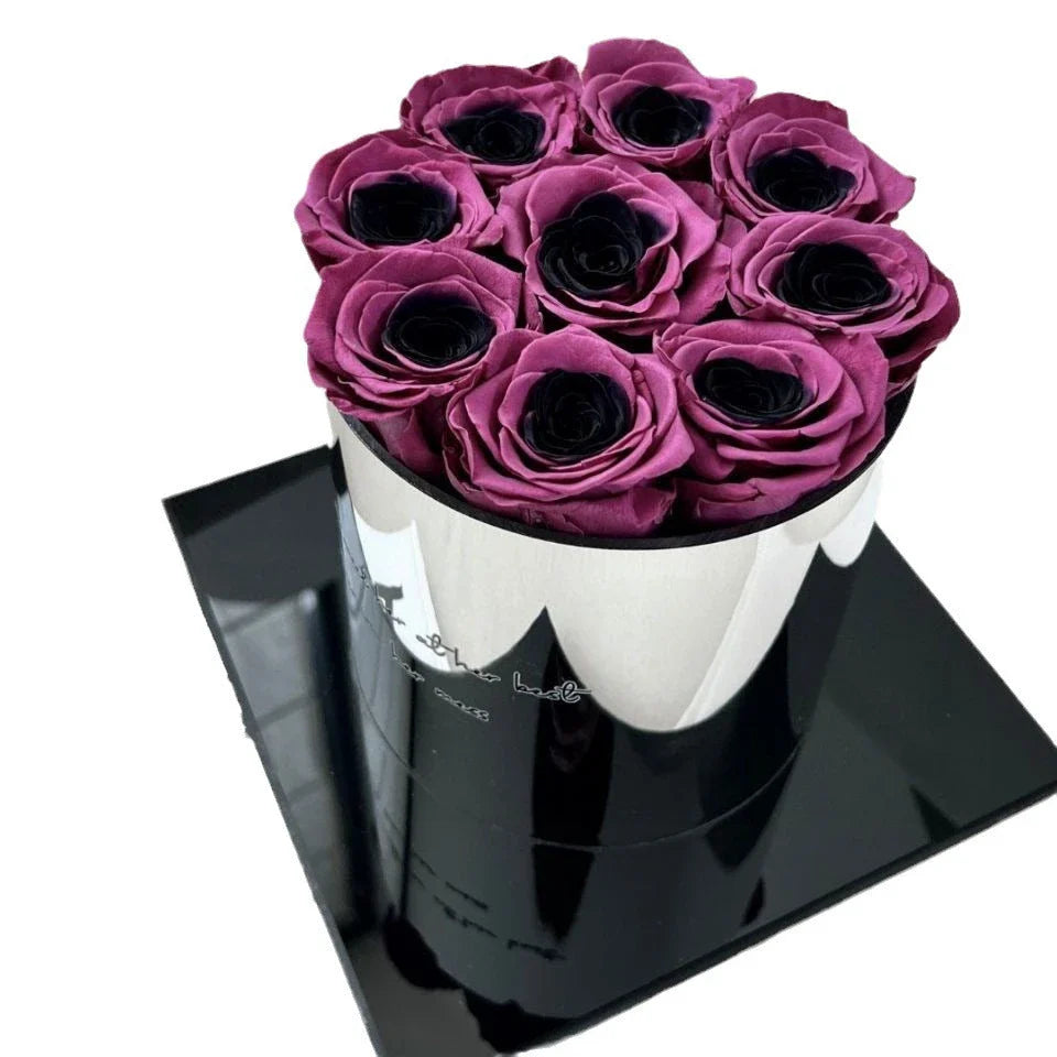 Elegant black plum bow flower pot with preserved plum blossoms, a sophisticated and long-lasting home decor piece